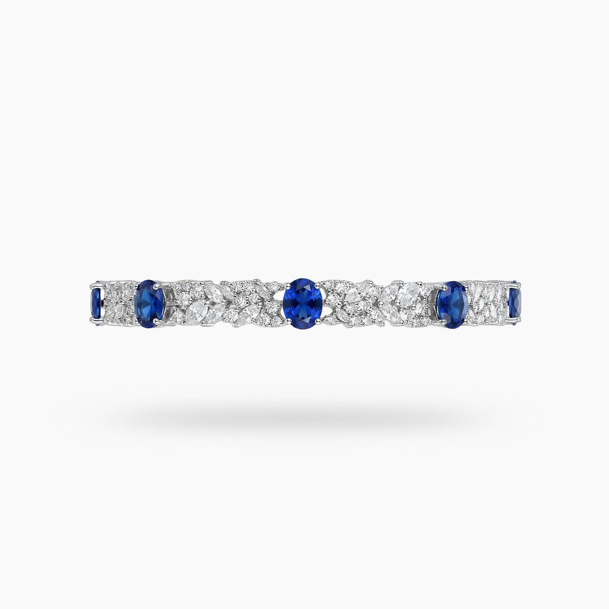White Gold Tennis Bracelet with Deep Blue Oval Sapphires