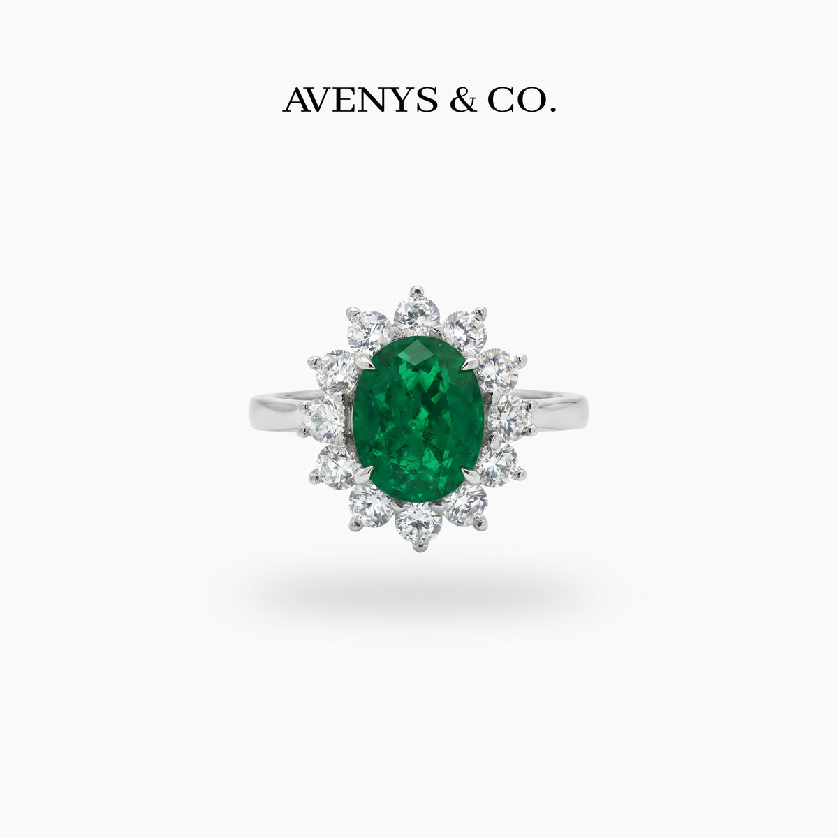 Classic Halo Ring with Green Oval Stone – on White Gold