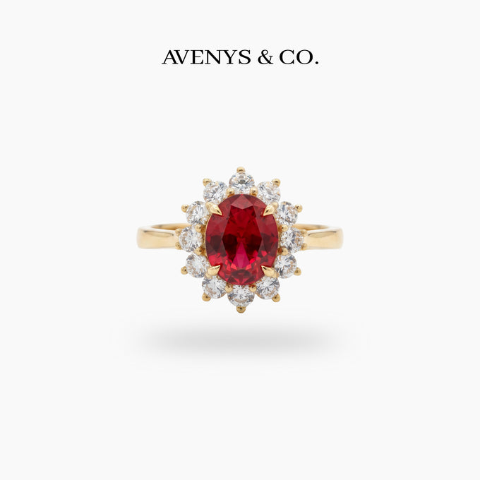 Classic Halo Ring with Red Oval Stone – on Yellow Gold