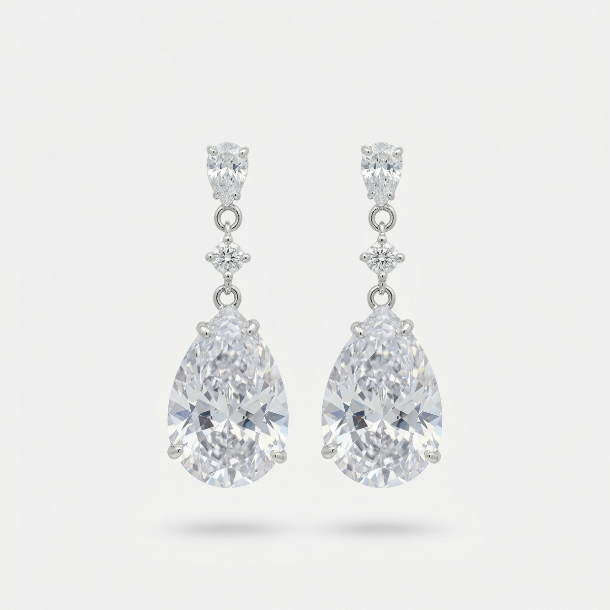 Pear Drop Earrings with White Pear Stone – on White Gold
