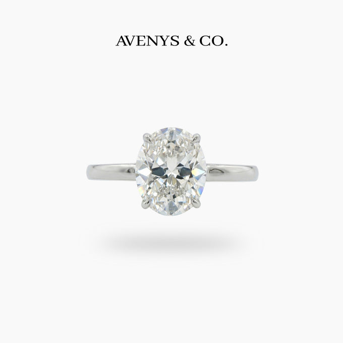 Oval Solitaire Ring with White Oval Stone – on White Gold