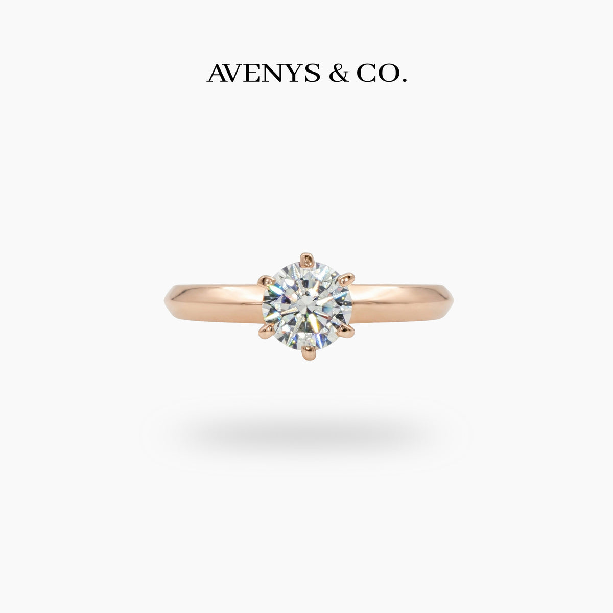 Delicate Solitaire Ring with White Round Stone – on Rose Gold