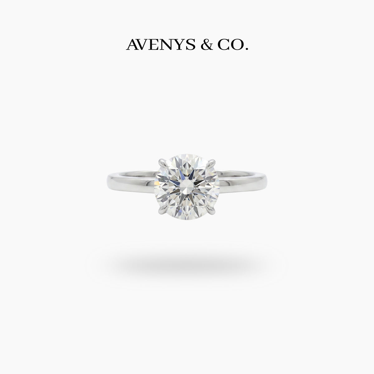 Round Solitaire Ring with White Round Stone – on White Gold