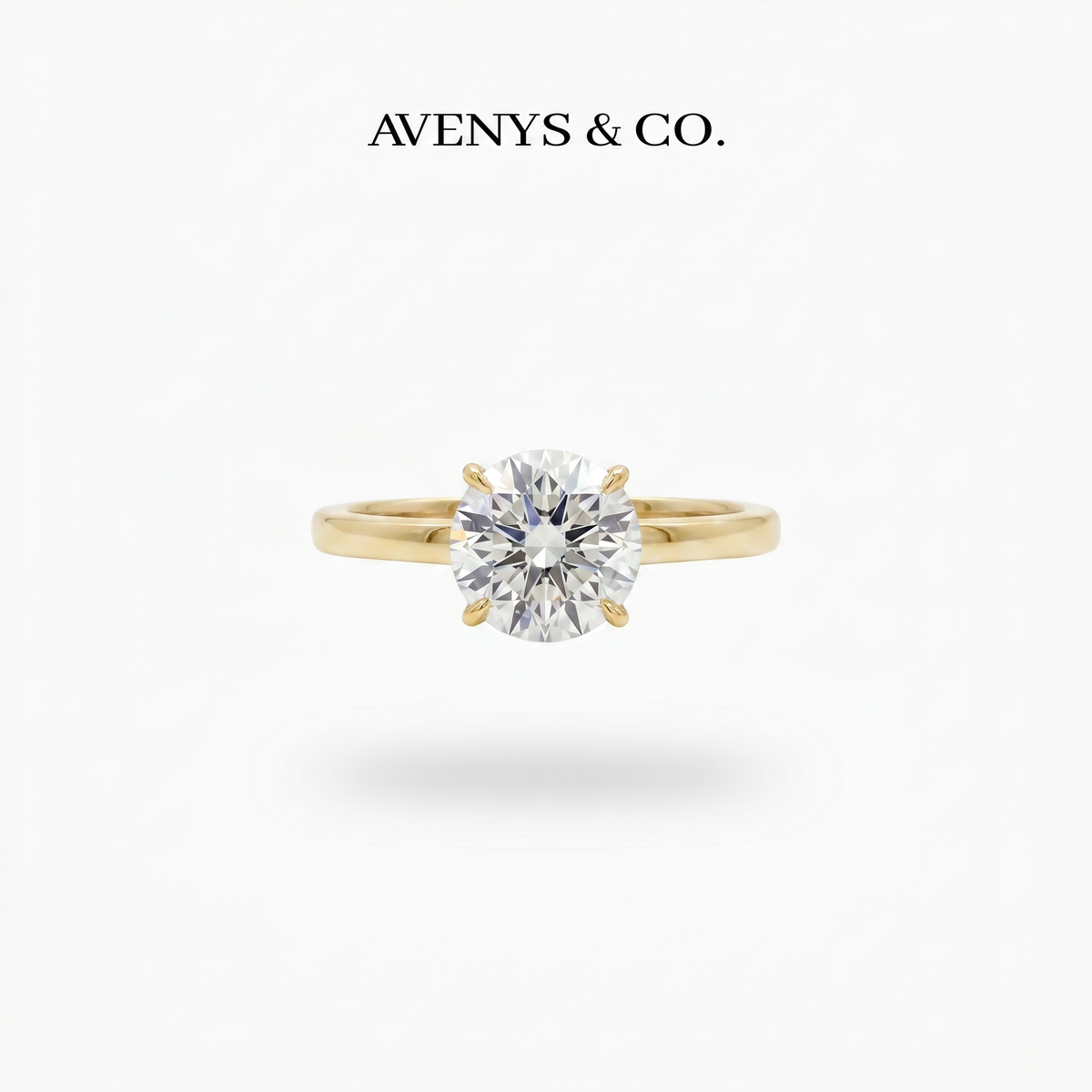 Round Solitaire Ring with White Round Stone – on Yellow Gold