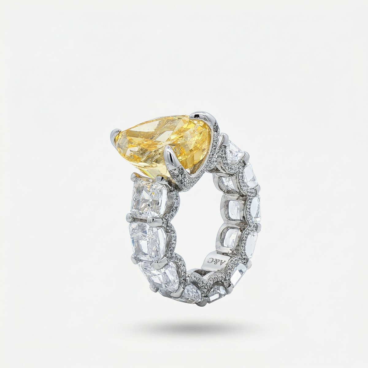 Queens Eternity Ring with Yellow Pear Stone – on White Gold