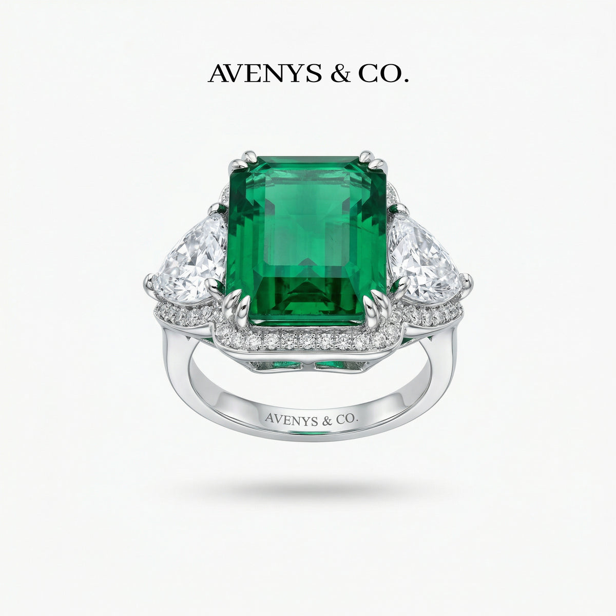 Queens Radiant Ring with Green Radiant Stone – on White Gold