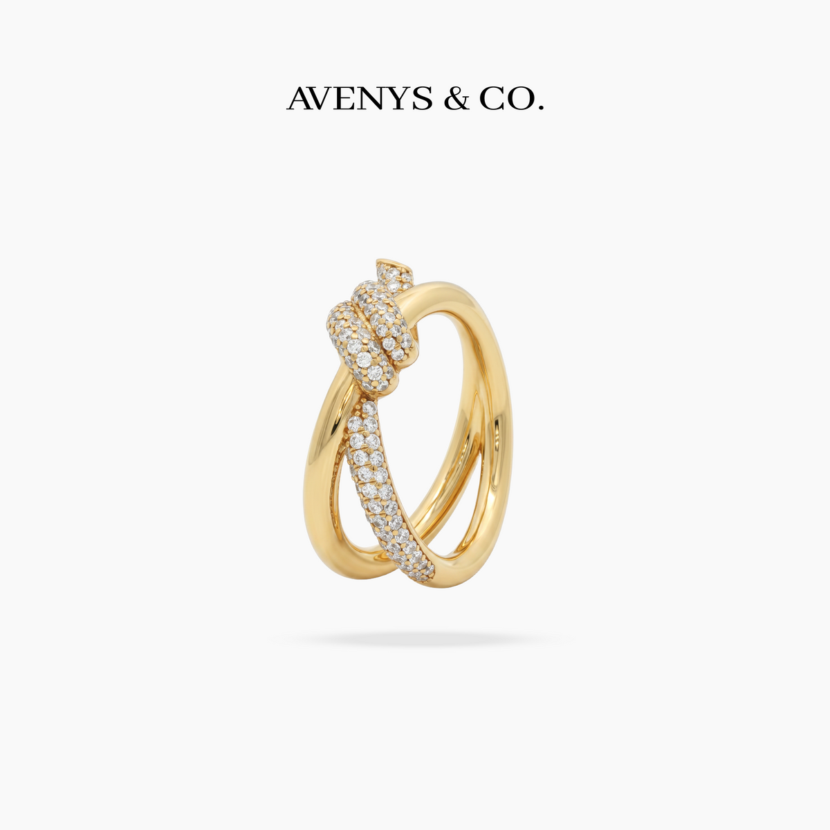Love Knot Ring with White Round Stone – on Yellow Gold