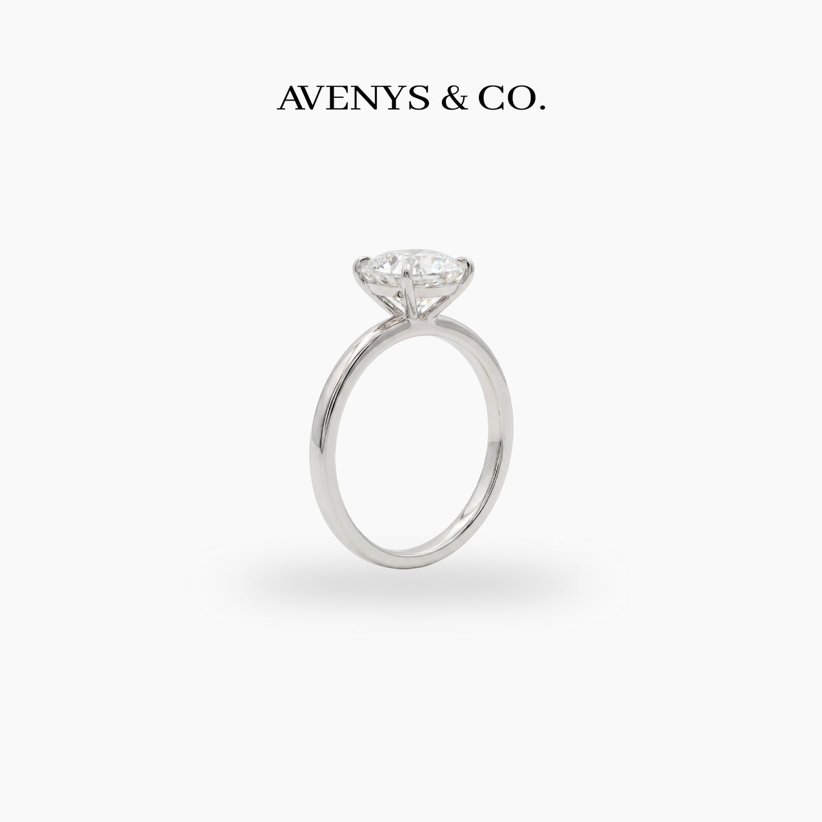 Round Solitaire Ring with White Round Stone – on White Gold