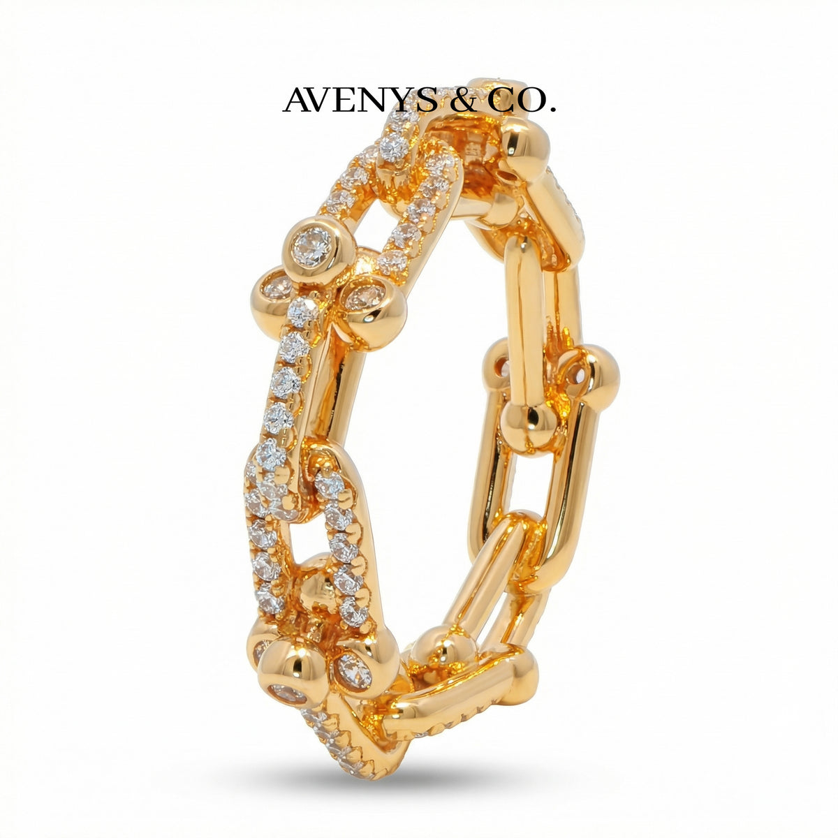 Interlock Pave Ring with White Round Stone – on Yellow Gold