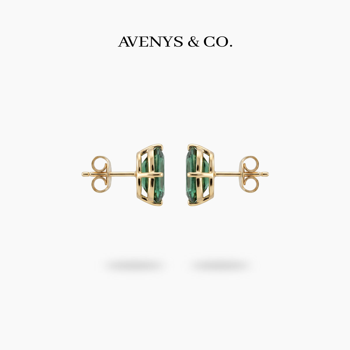 Modern Solitaire Earrings with Blue Oval Stone – on Yellow Gold