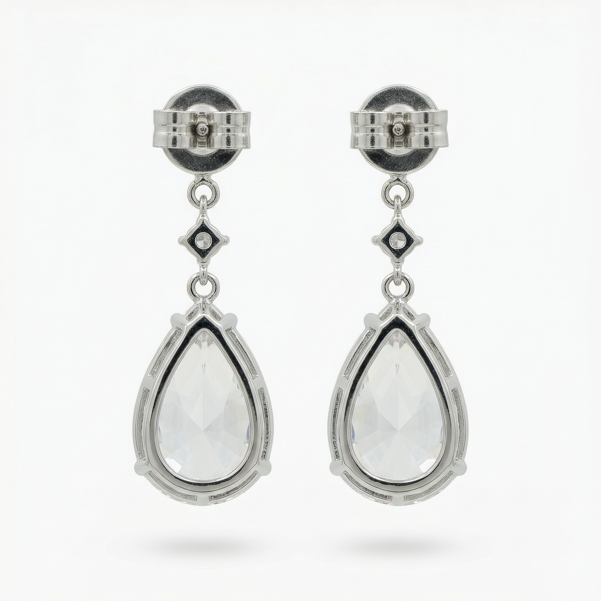 Pear Drop Earrings with White Pear Stone – on White Gold