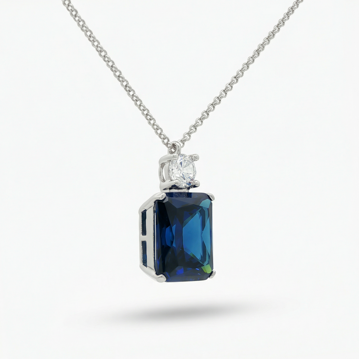 Radiant Pendant Necklace with Blue Radiant Stone – on White Gold
