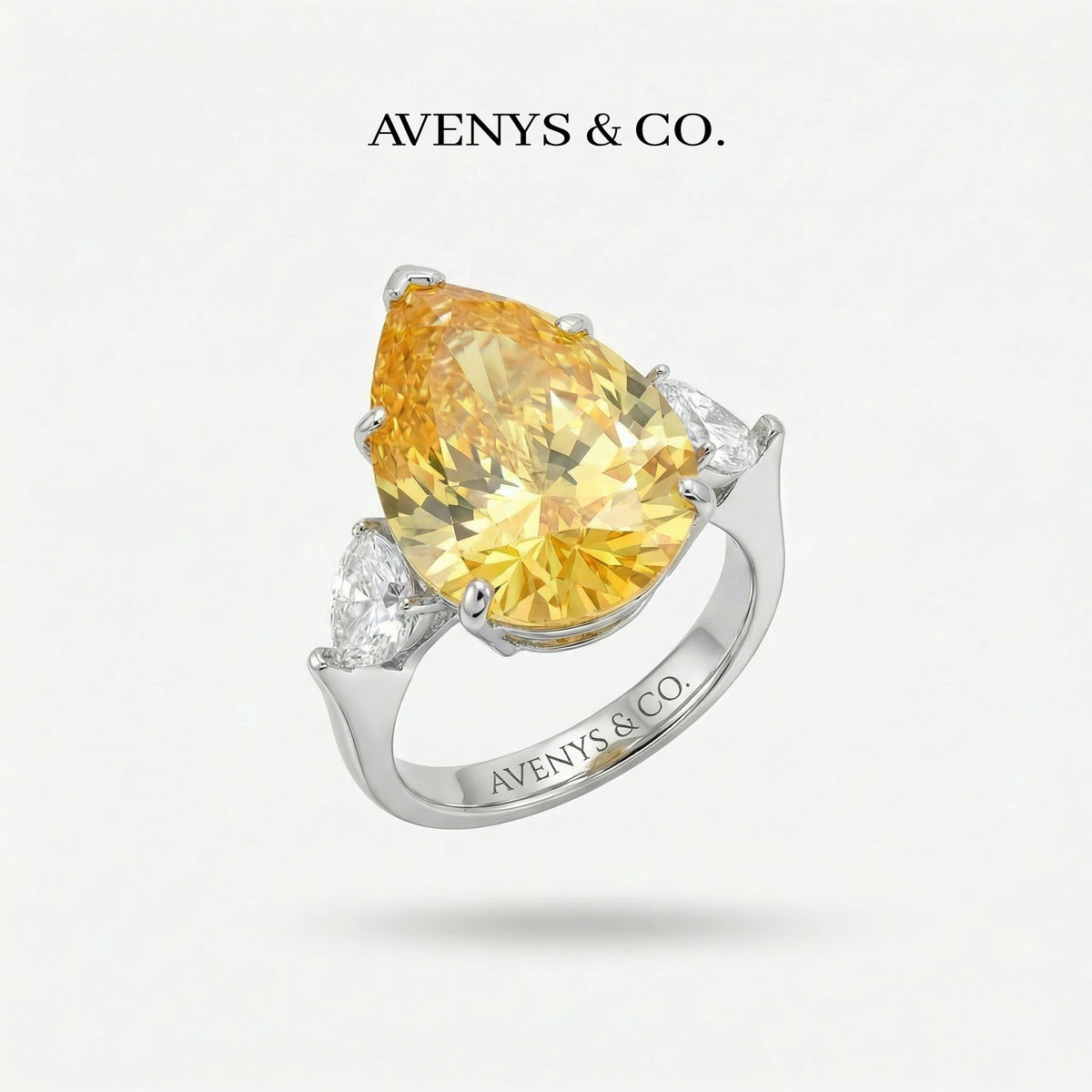 Pear Trilogy Ring with Yellow Pear Stone – on White Gold