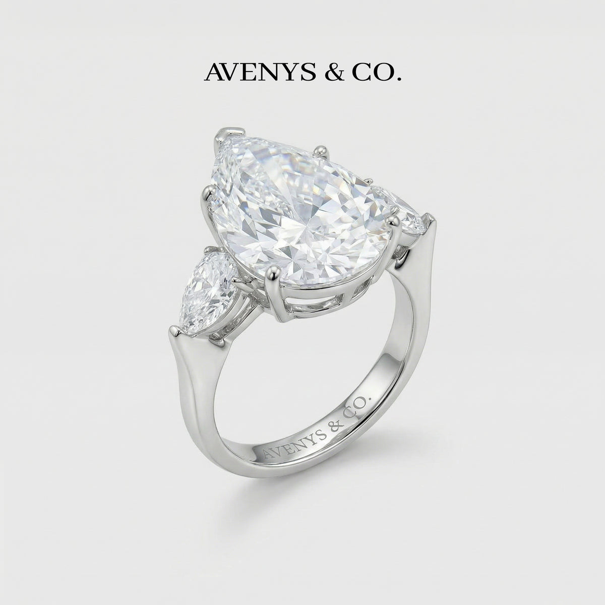 Pear Trilogy Ring with White Pear Stone – on White Gold
