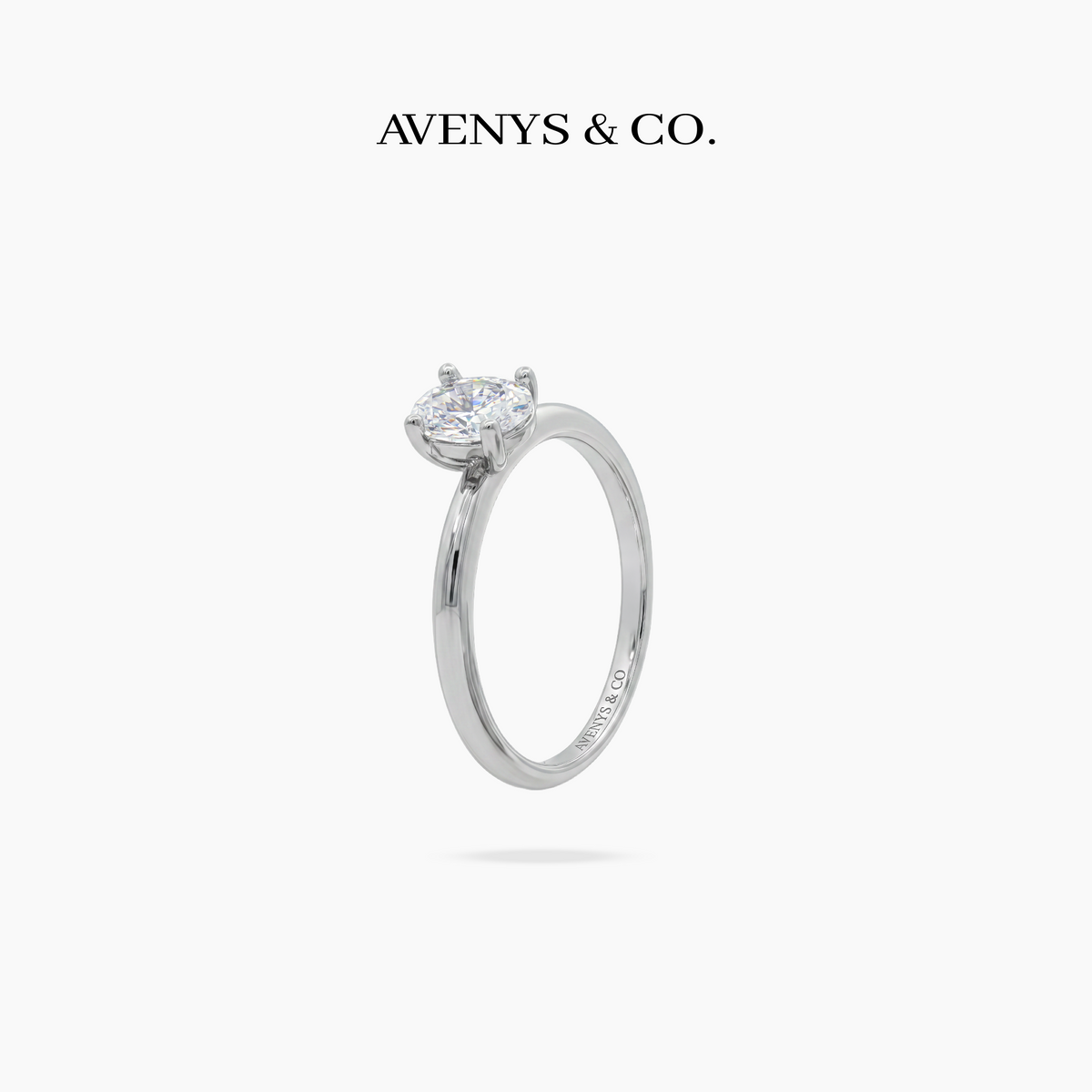Oval Delicate Ring with White Oval Stone – on White Gold