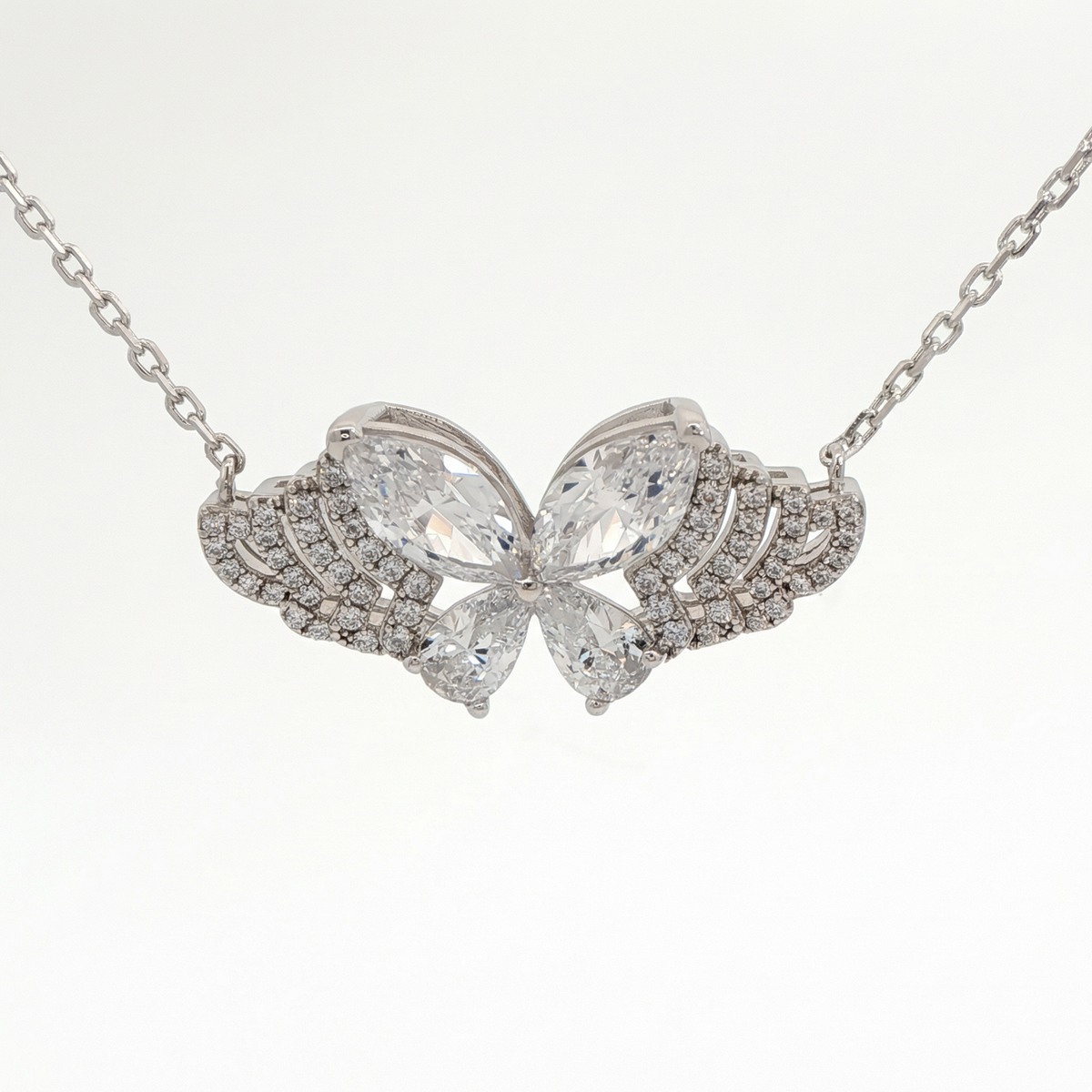 White Gold Plated Silver Butterfly Charm Necklace with Pear Cut Diamonds