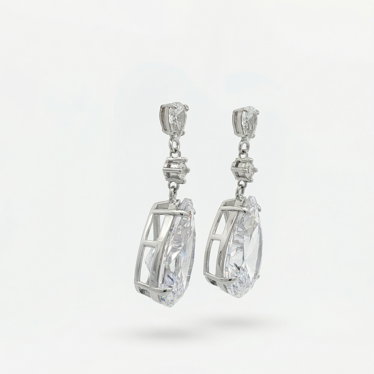 Pear Drop Earrings with White Pear Stone – on White Gold
