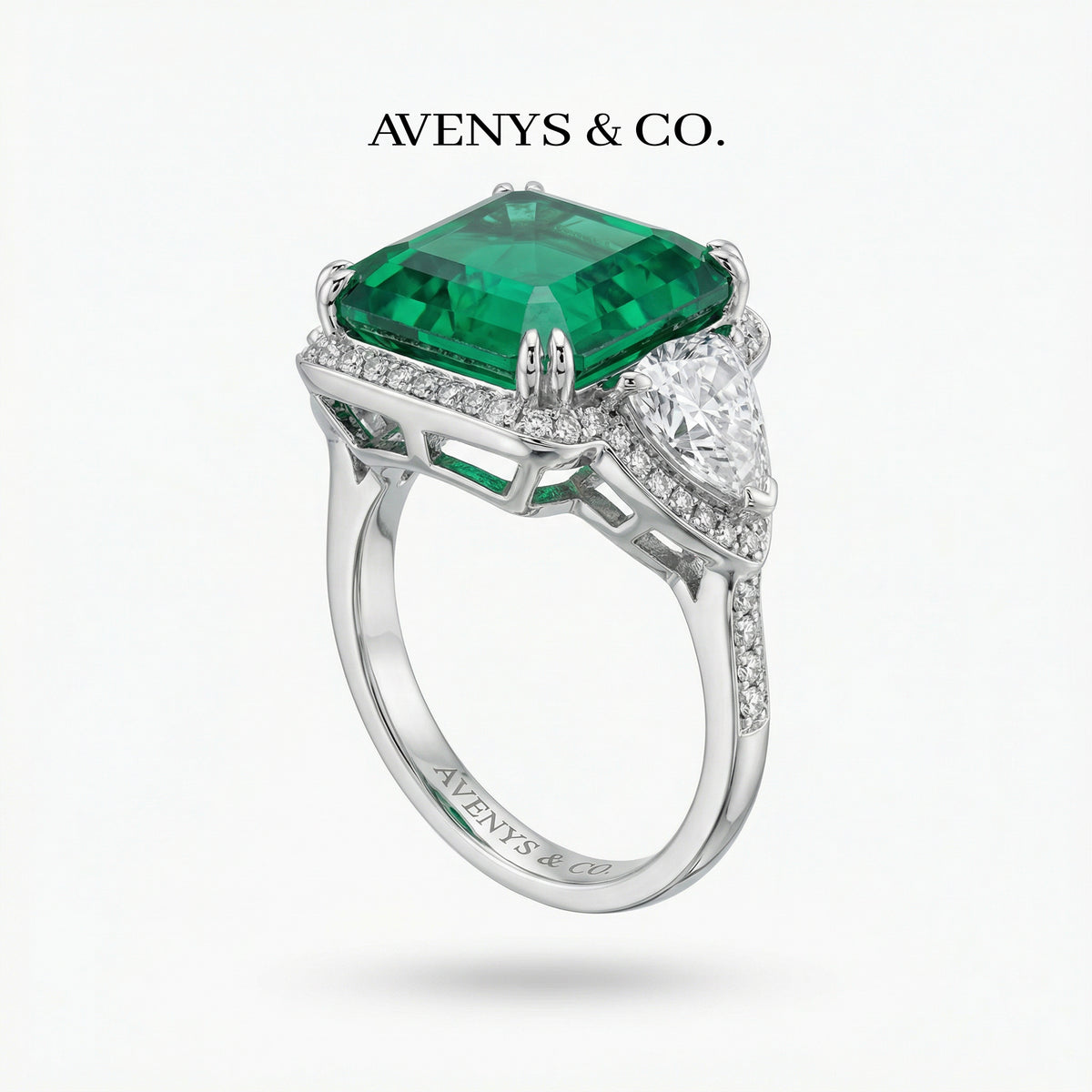Queens Radiant Ring with Green Radiant Stone – on White Gold