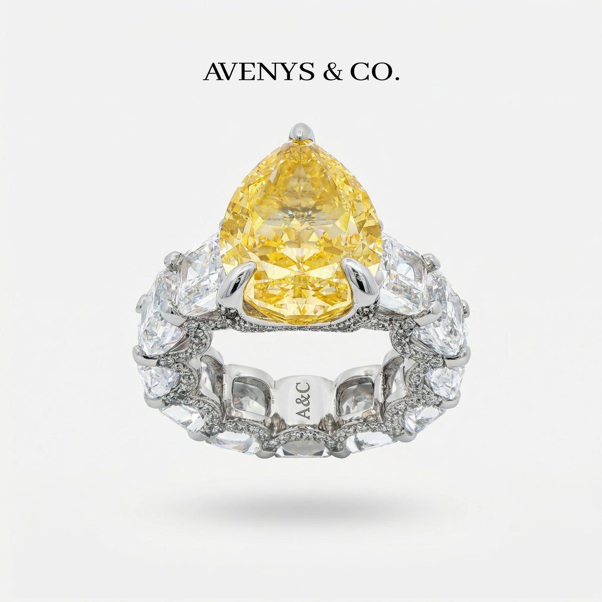 Queens Eternity Ring with Yellow Pear Stone – on White Gold