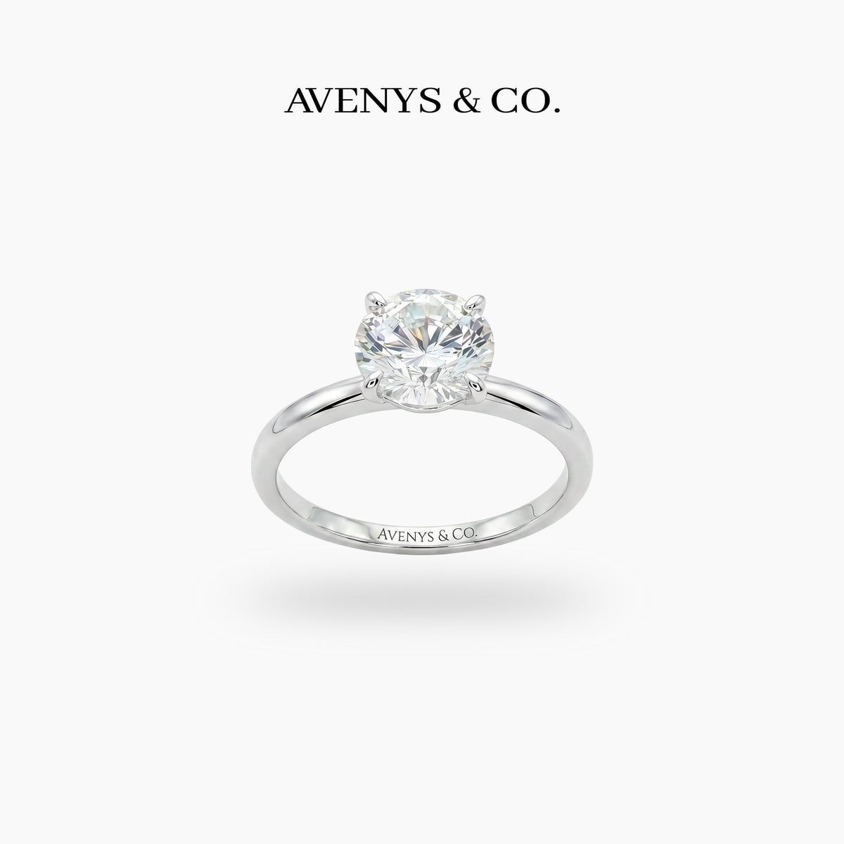 Round Solitaire Ring with White Round Stone – on White Gold