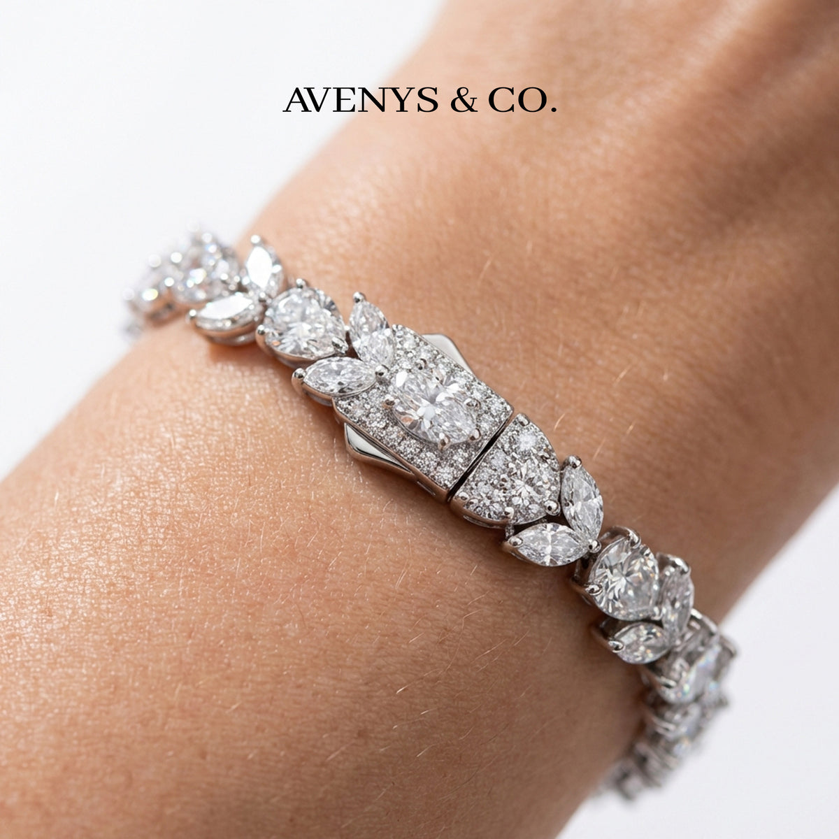 Tennis Bracelet with Pear Cut White Stone