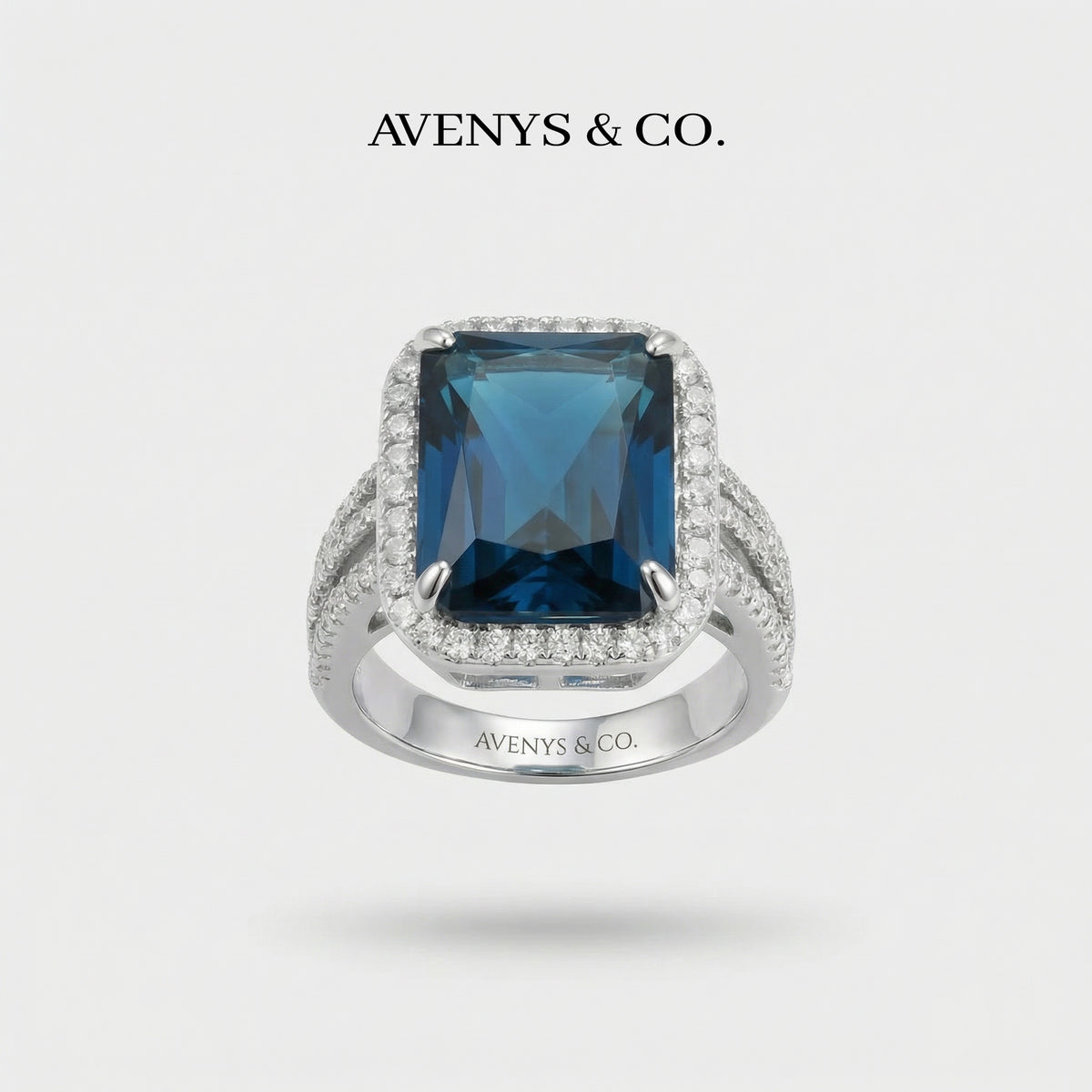 Triple Shank Radiant Ring with Blue Radiant Stone – on White Gold