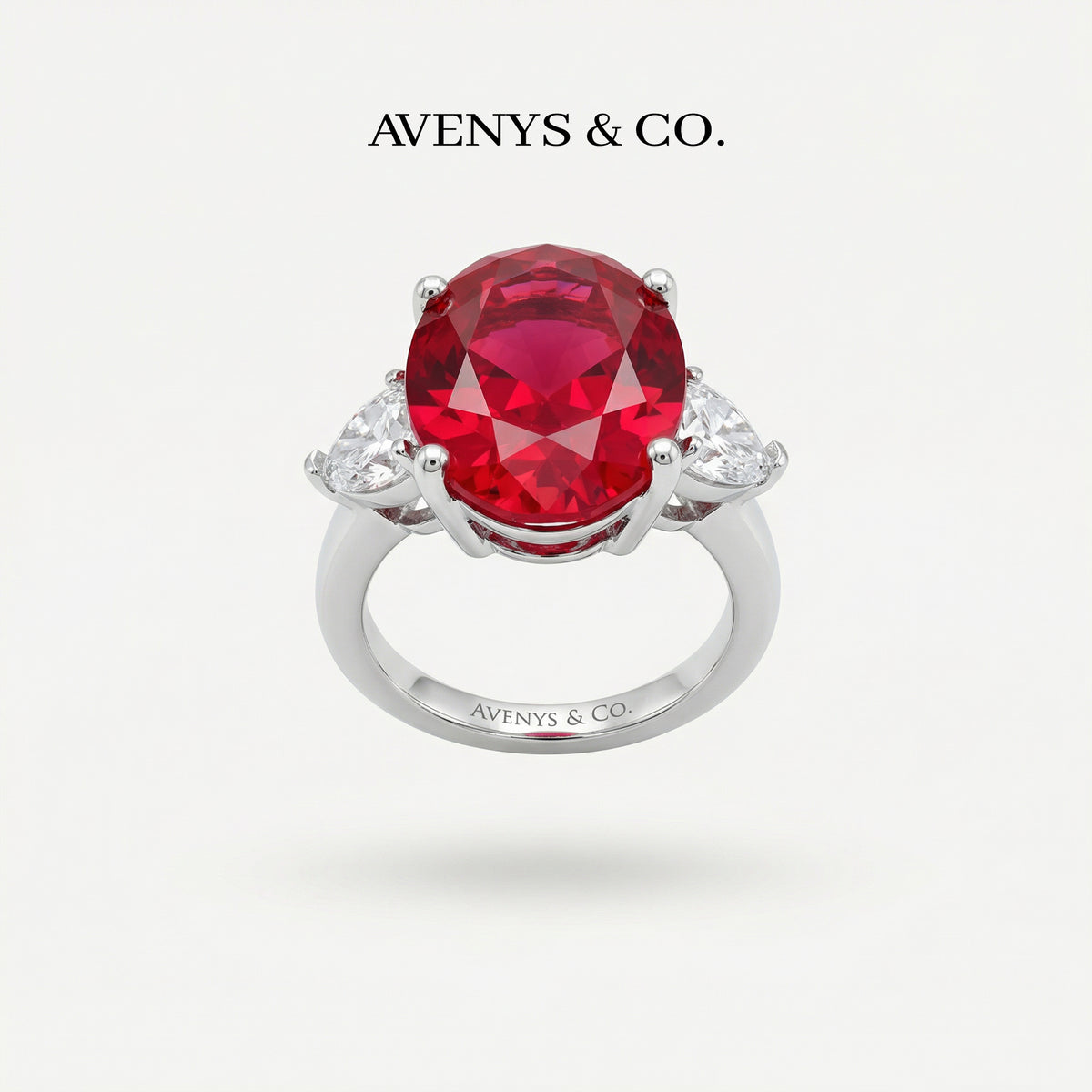 Oval Trilogy Pear Ring with Red Oval Stone – on White Gold