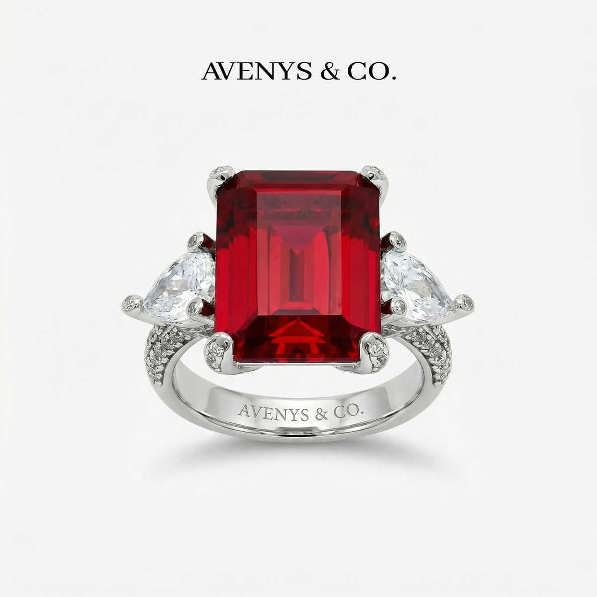 Emerald Pear Trilogy Ring with Red Emerald Stone – on White Gold