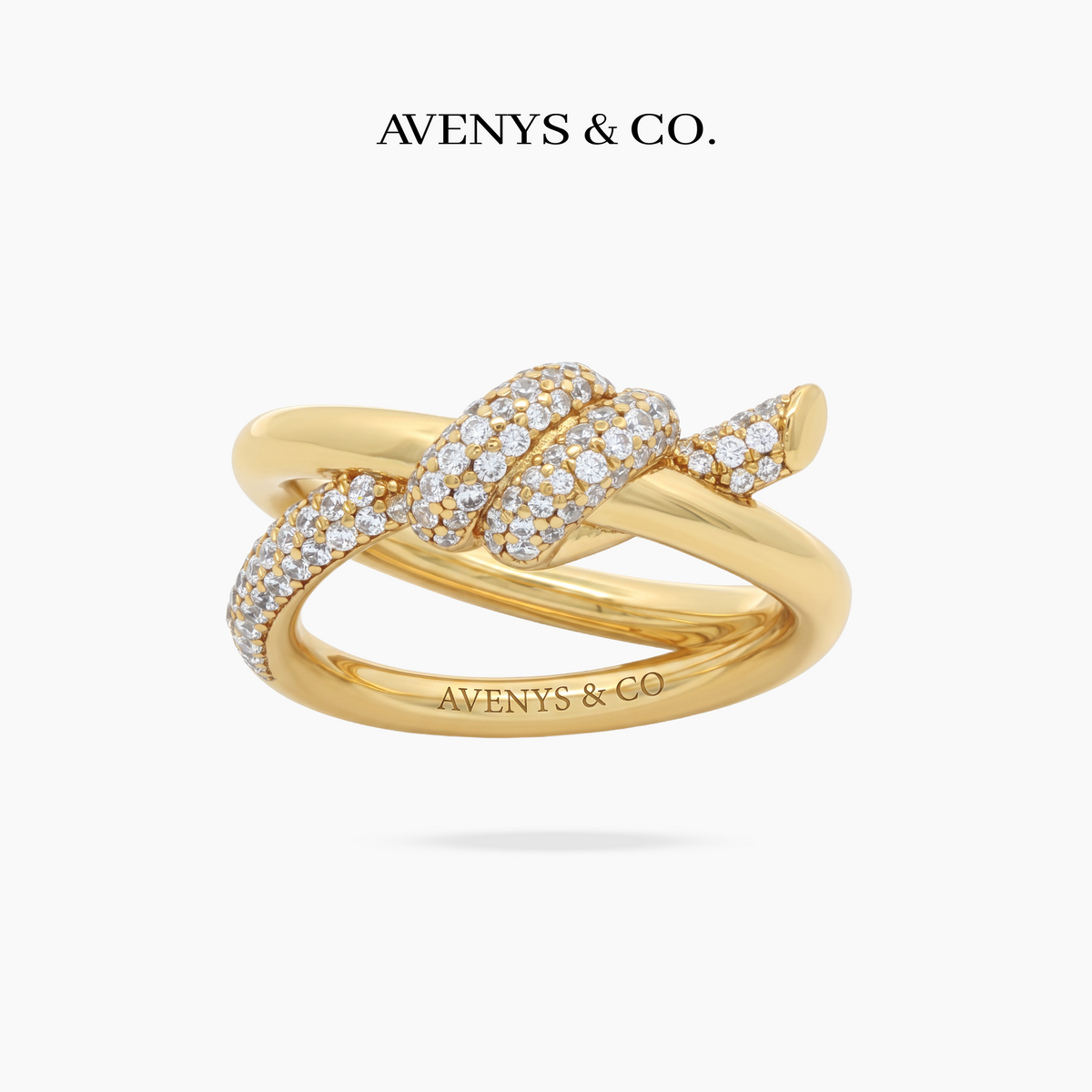 Love Knot Ring with White Round Stone – on Yellow Gold