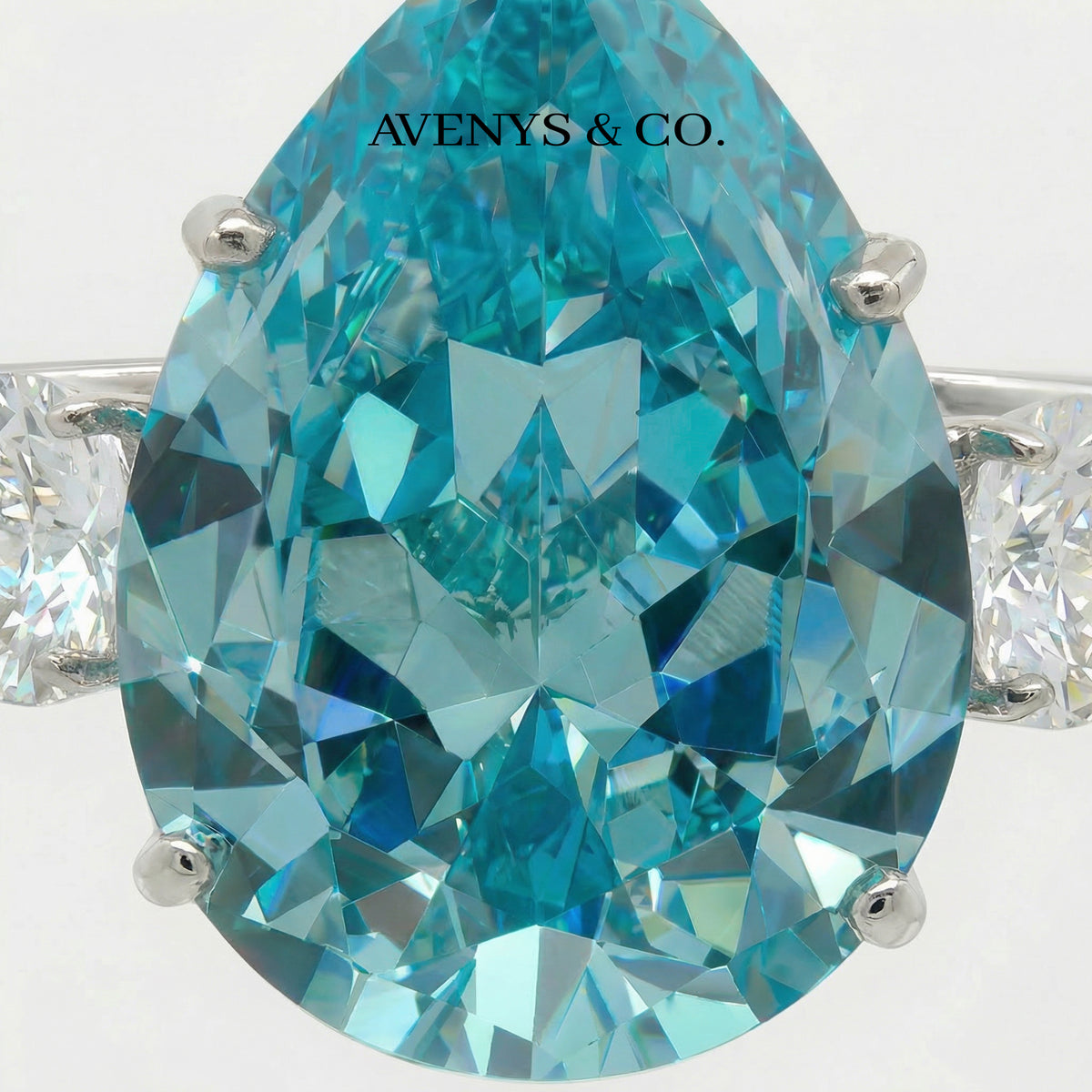 Pear Trilogy Ring with Aquamarine Pear Stone – on White Gold