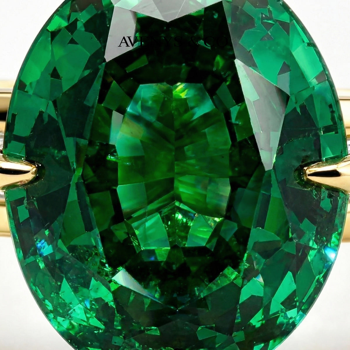 Oval Baguette Ring with Green Oval Stone – on Yellow Gold