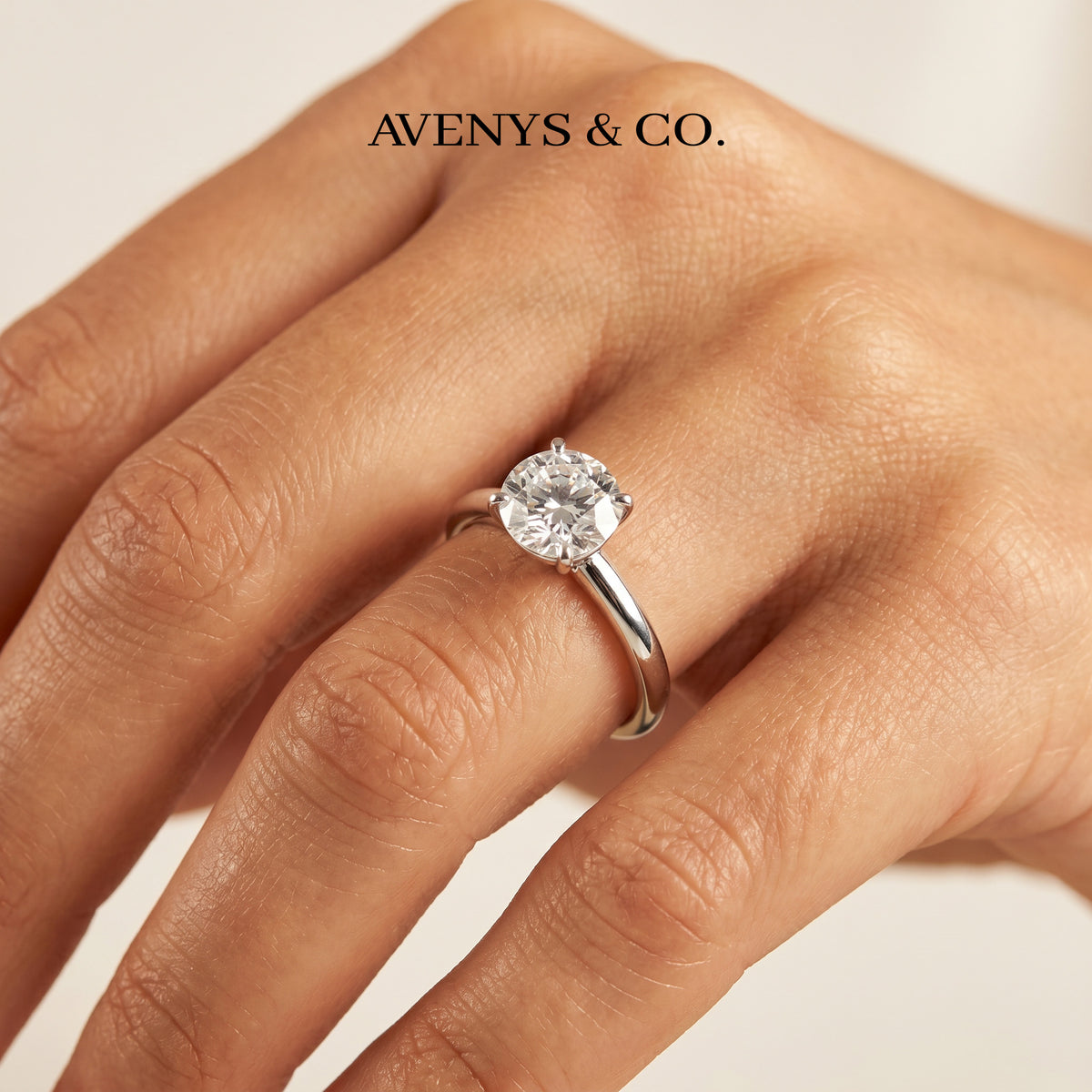Round Solitaire Ring with White Round Stone – on White Gold