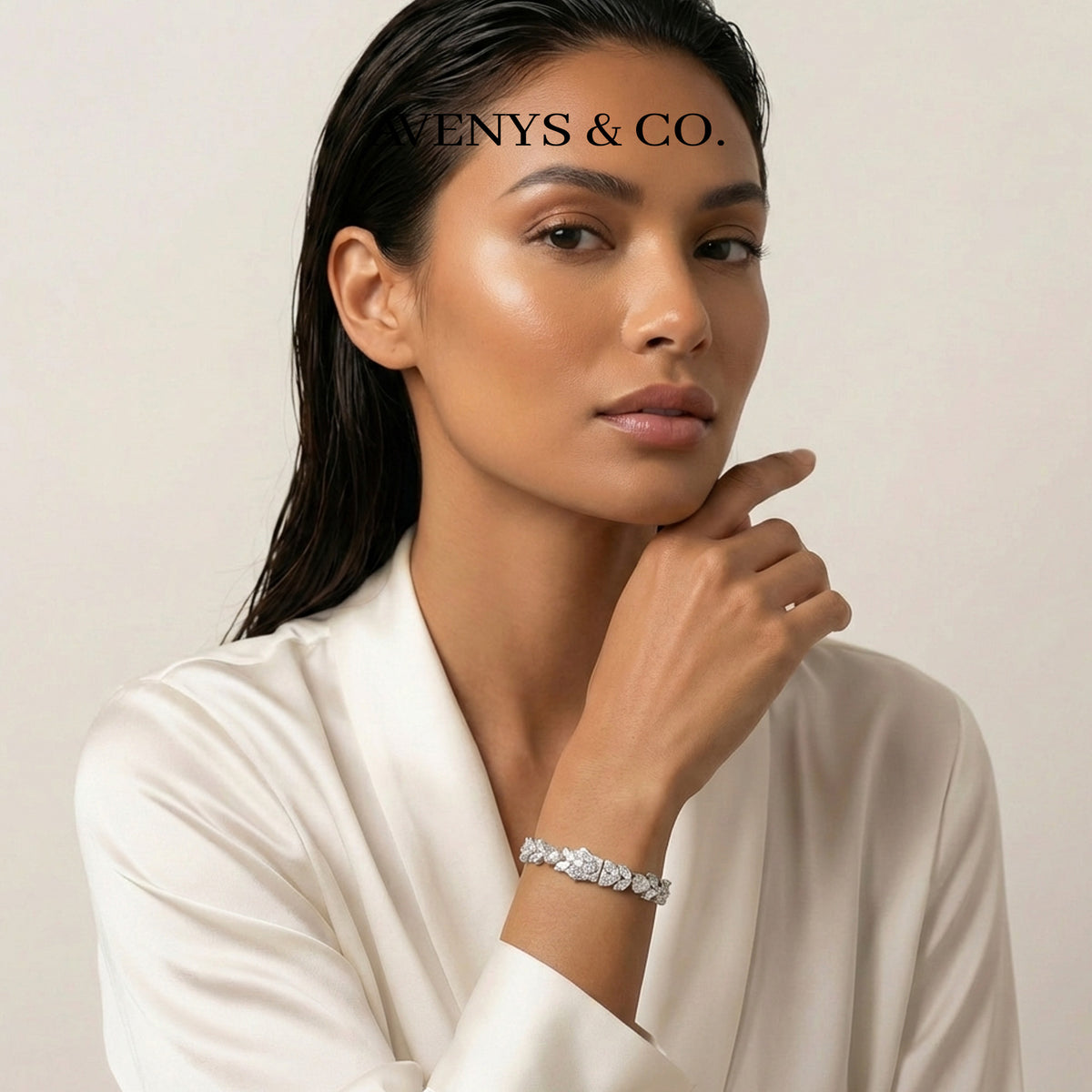 Tennis Bracelet with Pear Cut White Stone