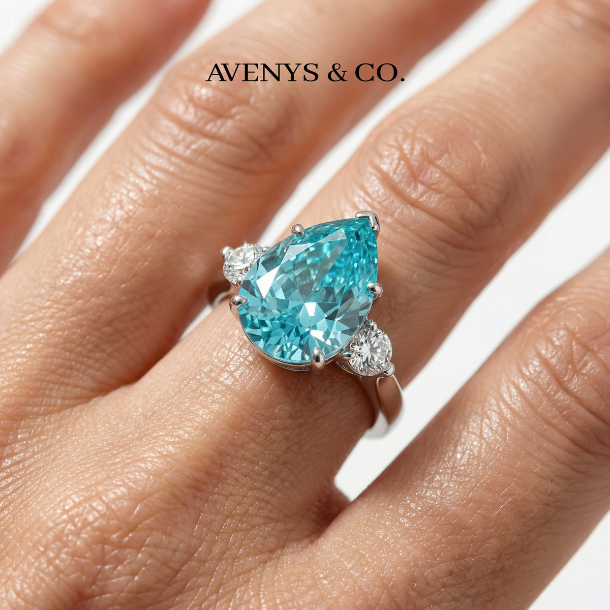 Pear Trilogy Ring with Aquamarine Pear Stone – on White Gold