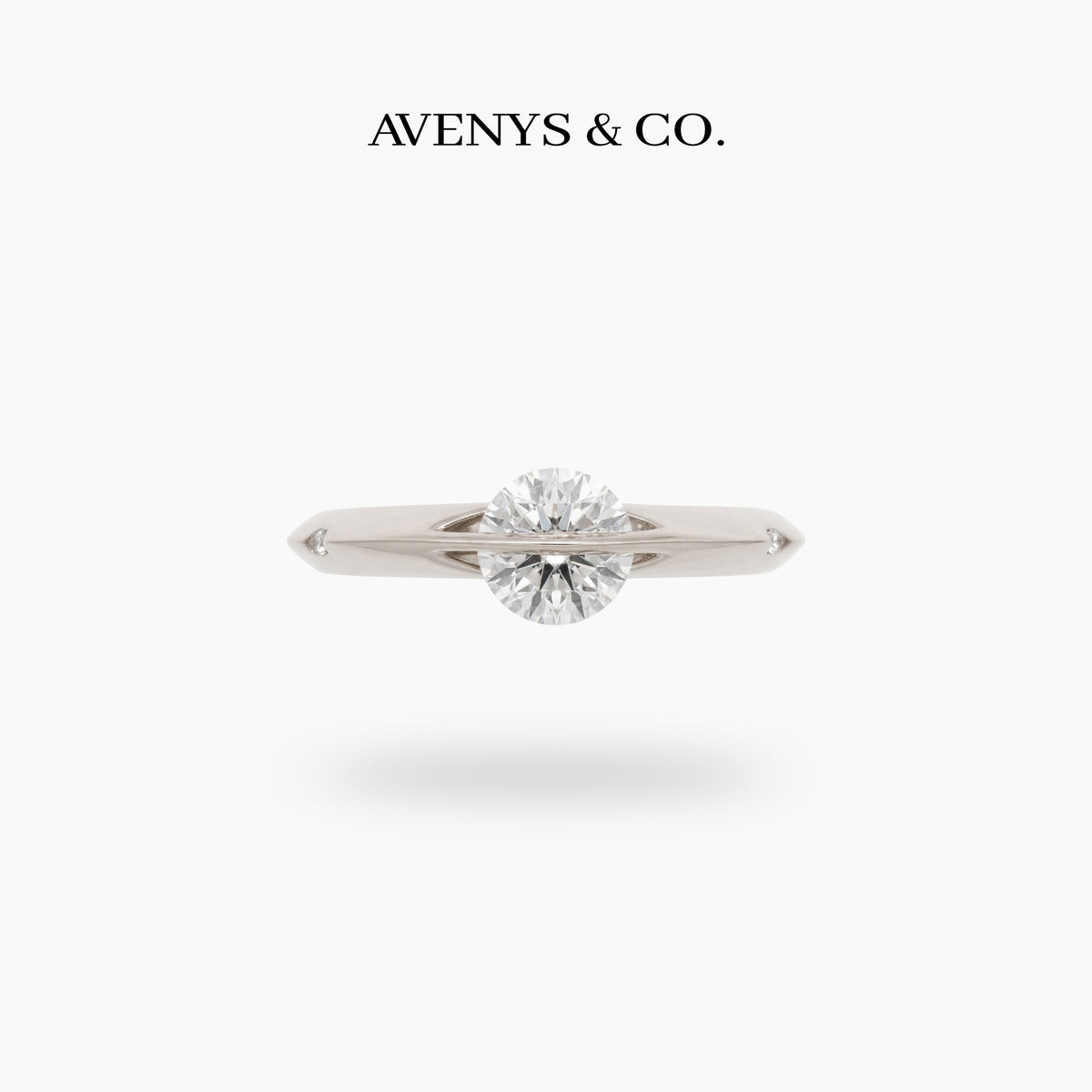Dancing Diamonds Slim Ring with White Round Stone – on White Gold