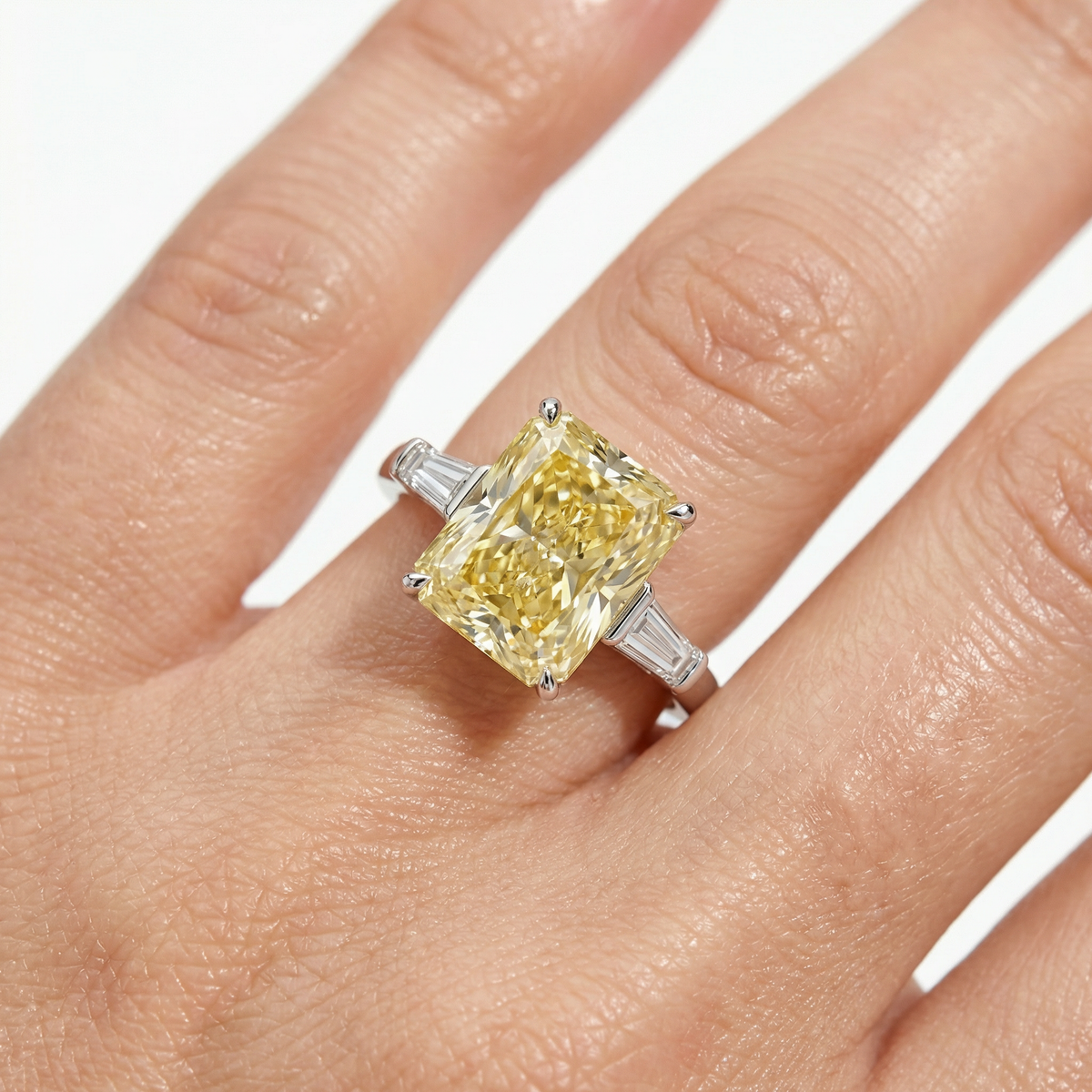 Radiant Trilogy Ring with Yellow Radiant Stone – on White Gold
