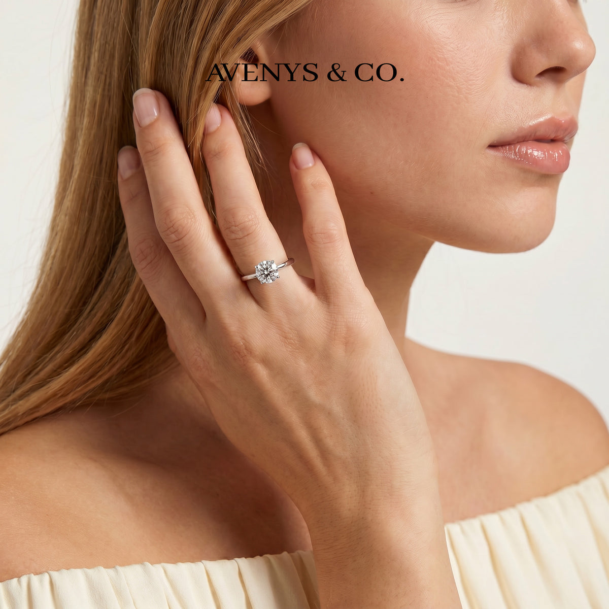 Round Solitaire Ring with White Round Stone – on White Gold