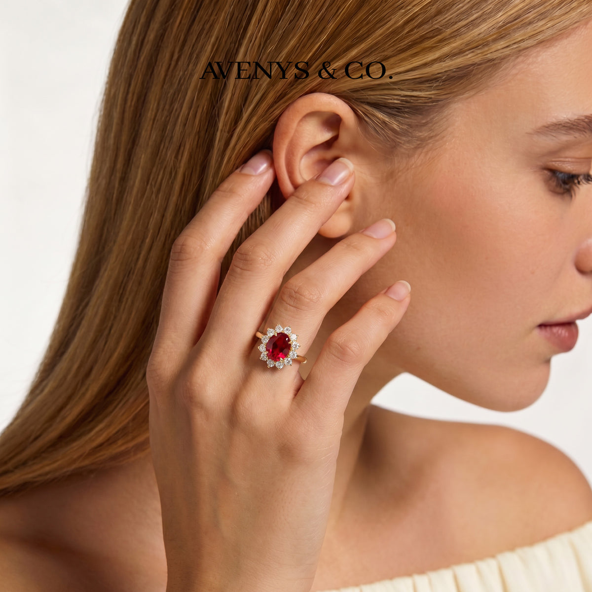 Classic Halo Ring with Red Oval Stone – on Yellow Gold