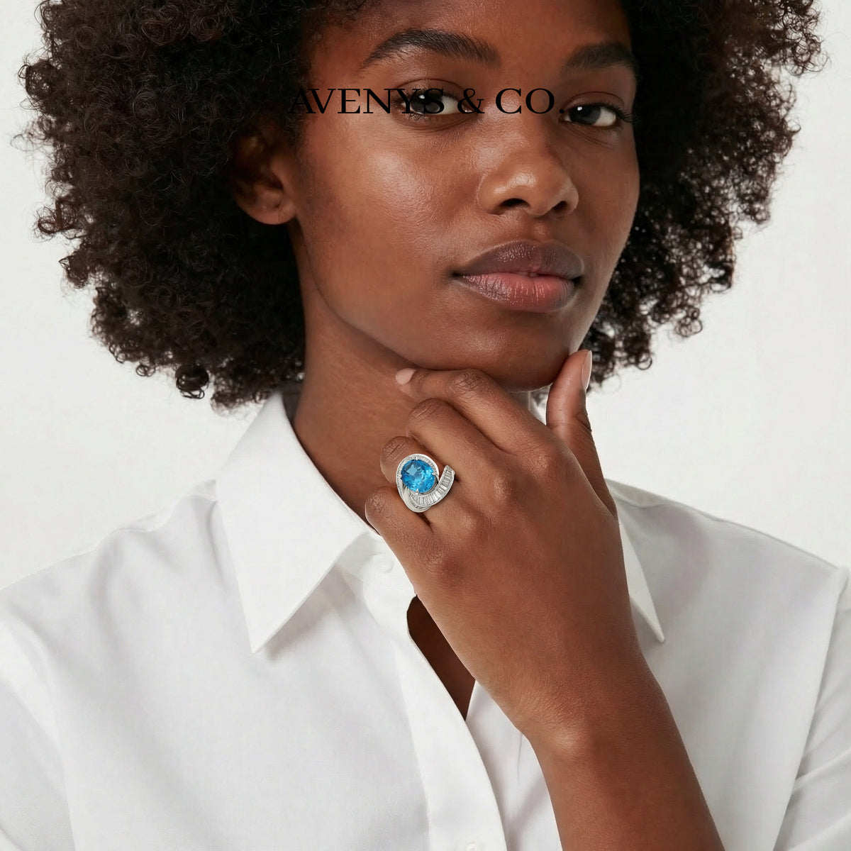 Eclipse Ring with Blue Oval Stone – on White Gold