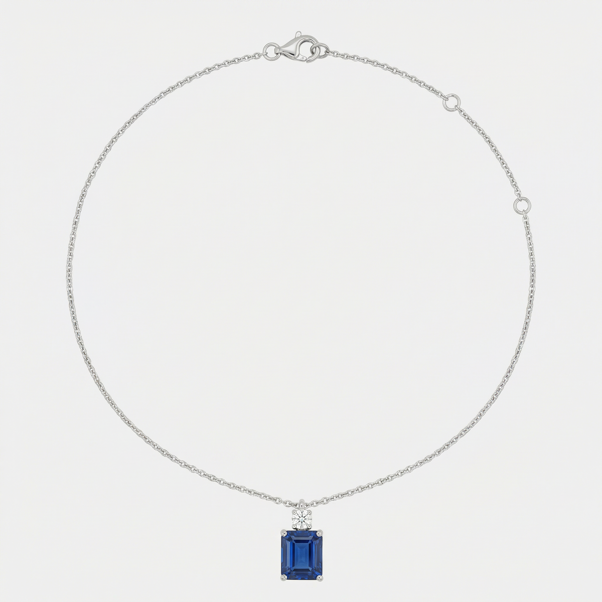 Radiant Pendant Necklace with Blue Radiant Stone – on White Gold