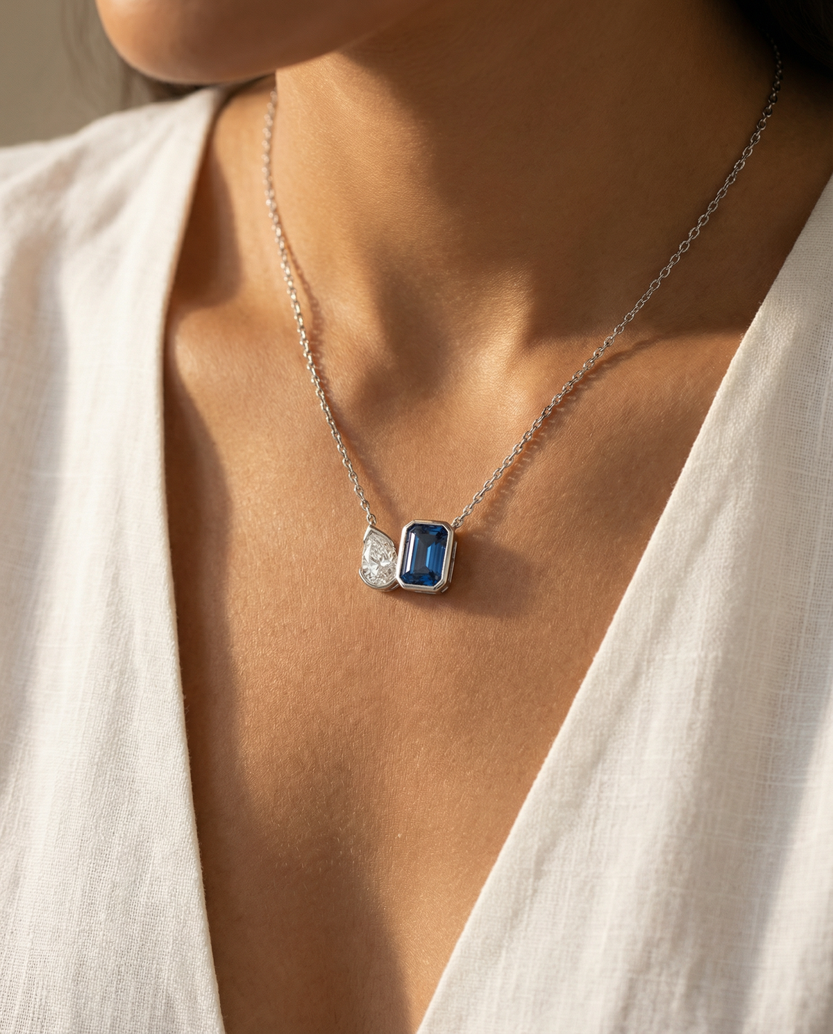 Duality Necklace with Blue Emerald Stone – on White Gold