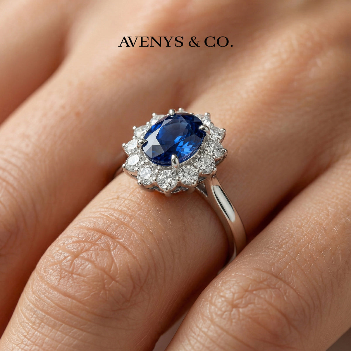 Classic Halo Ring with Blue Oval Stone – on White Gold