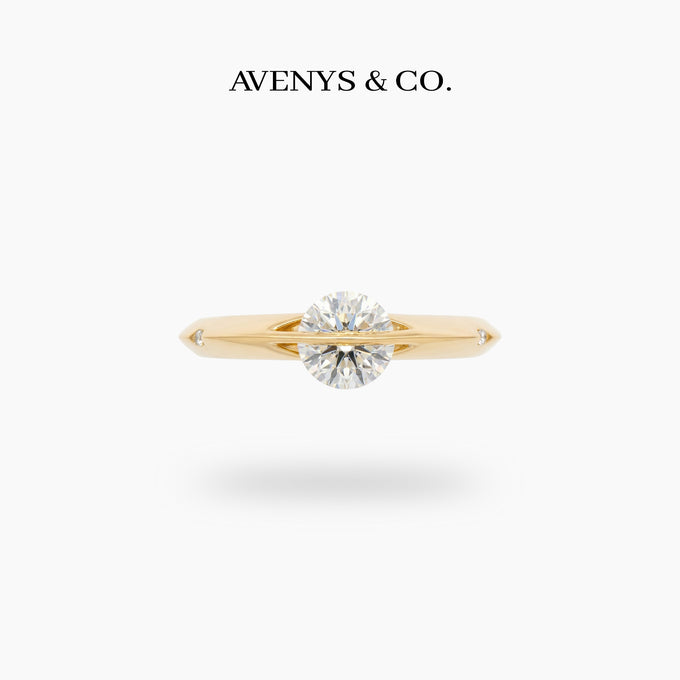 Dancing Diamonds Slim Ring with White Round Stone – on Yellow Gold