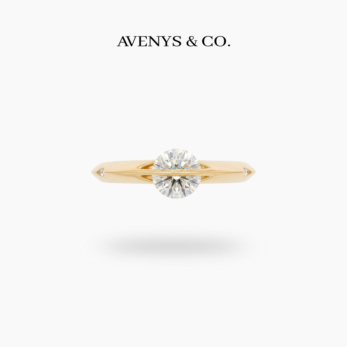 Dancing Diamonds Slim Ring with White Round Stone – on Yellow Gold