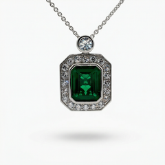 Emerald and Diamond Charm Necklace in White Gold Plated Silver