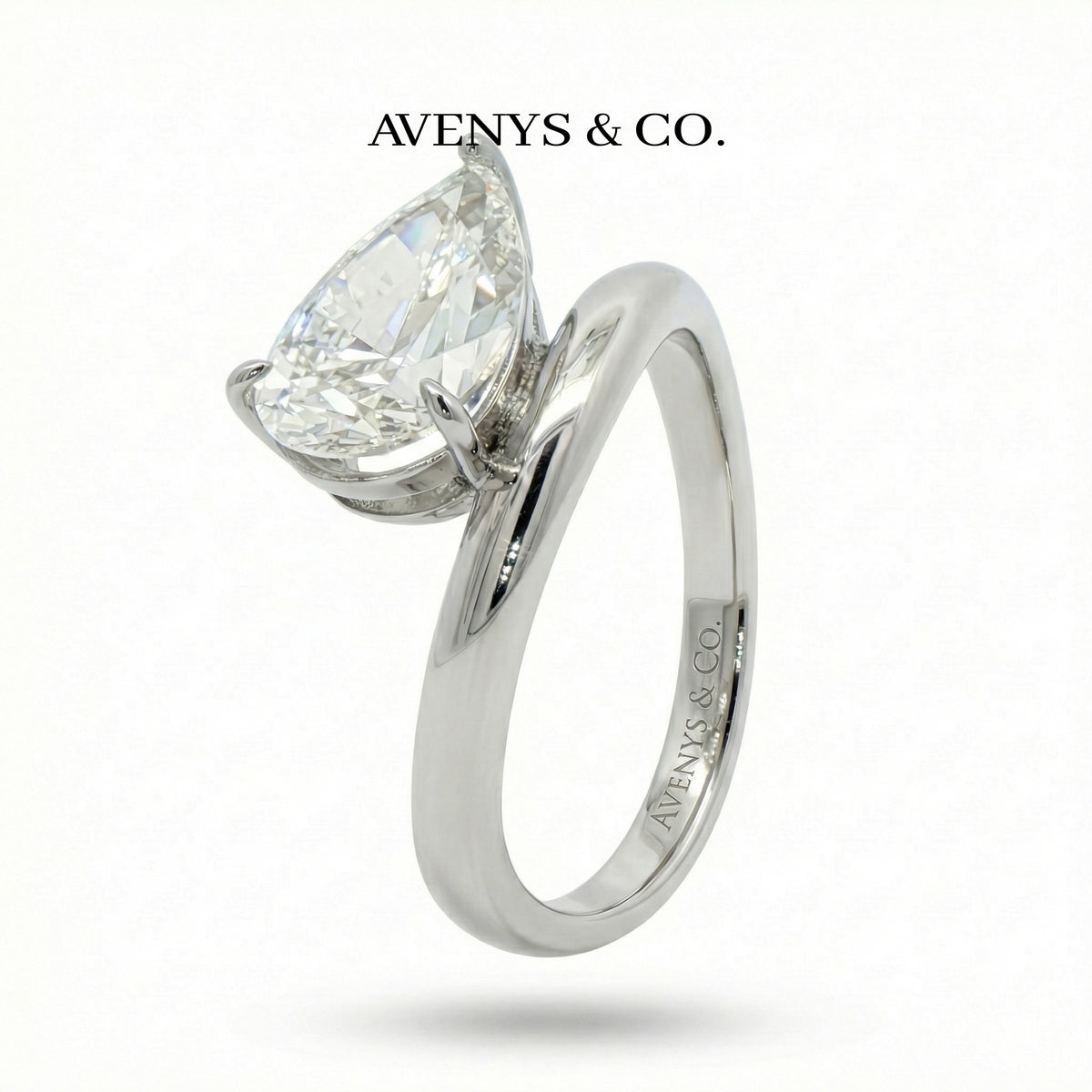 Wave Solitaire Ring with White Pear Stone – on White Gold
