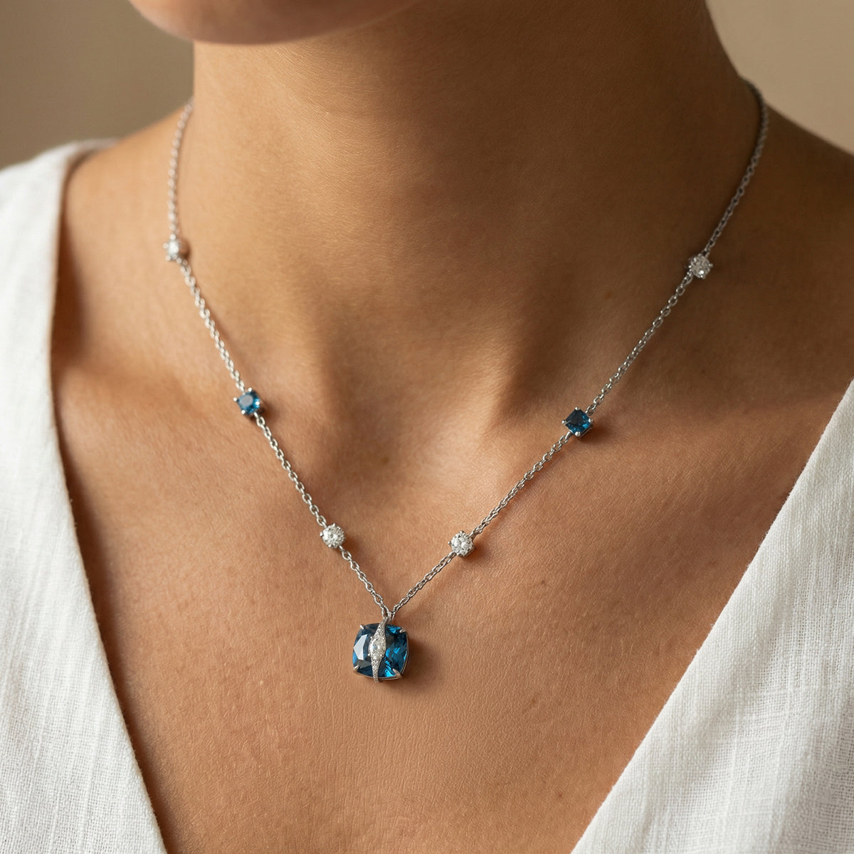 Embrace Pave Necklace with Blue Cushion Stone – on White Gold