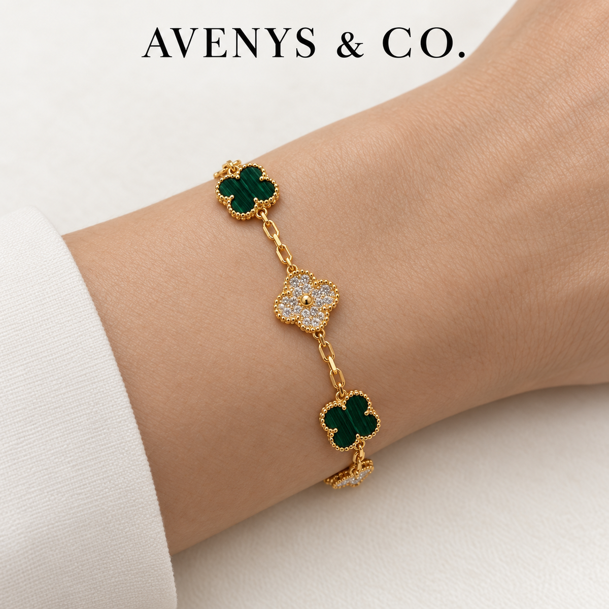 Green malachite and Diamond Burst bracelet worn on a wrist