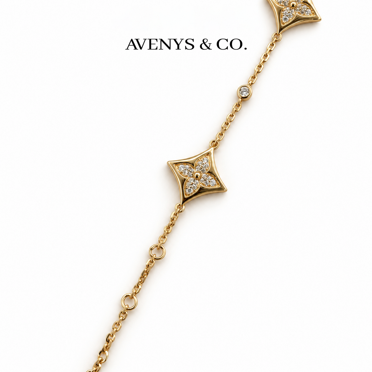 AV Bloom Starburst Bracelet on Yellow Gold — chain and adjustment detail