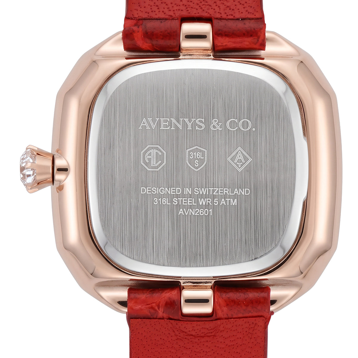 Avenys Capri Scarlet caseback close-up from the original product photograph, showing the brushed steel back, original engraving, 5 ATM marking, AVN2601 reference and red leather strap attachments